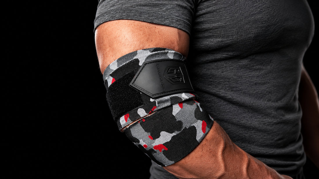 WAR WRAPS Elbow Wraps worn on arm in training setup - BARBARIAN GOLD